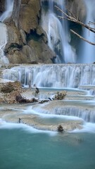 Long explosure Tat Kuang Si waterfall famous place in Luang Prabang, Laos