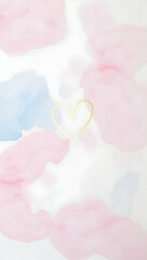 Delicate, pastel-toned background with a golden heart shape.