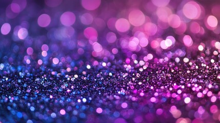 Colorful Glitter Background with Bokeh Effect in Vibrant Shades of Purple and Blue for Festive and Celebratory Themes