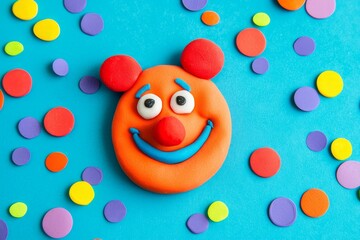 A playful April Fool's Day message made entirely of multi-colored plasticine