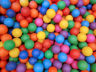 Many color plastic balls background.
