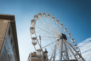 Ferris wheel against a blue sky