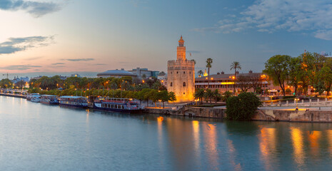 Scenic view of the Golden Tower in Seville at sunset. Spain. Andalusia.
