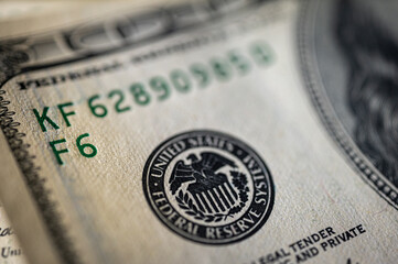 Close-up view of a 100 dollar bill with details, texture and vibrant colors. Perfect for finance, banking and wealth themes, vertical photo, wallpaper