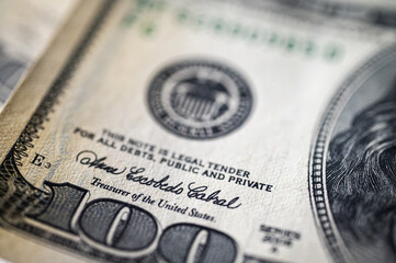 Close-up view of a 100 dollar bill with details, texture and vibrant colors. Perfect for finance, banking and wealth themes, vertical photo, wallpaper