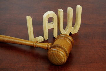 Judge gavel and word LAW close-up	