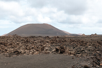 Volcanic lava mountains in Timanfaya National Park in Lanzarote in Spain