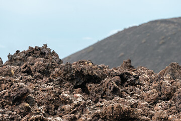 Volcanic lava mountains in Timanfaya National Park in Lanzarote in Spain