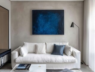 Modern living room features a white sofa and blue artwork