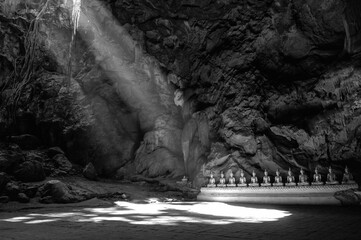 Statue of Buddha in Buddhism Cave in Thum Khao Luang in Phetchaburi Province, Thailand