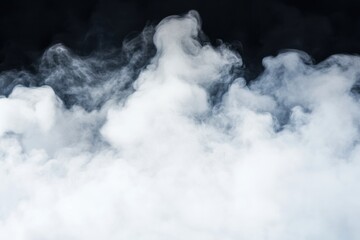 Obraz premium A mesmerizing formation of white smoke billowing against a dark background, creating a mystical atmosphere.