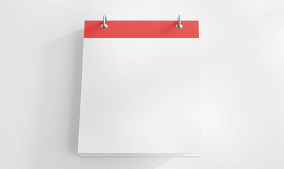 Minimalist Calendar with Blank White Page and Red Binding Hanging on White Wall for Office Organization