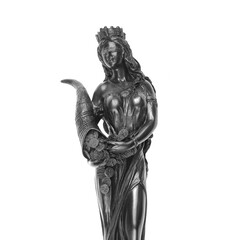 Statuette of Demeter goddess of fertility isolated on white background