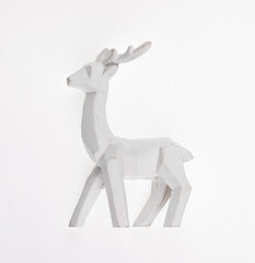 white wooden deer isolated on white background