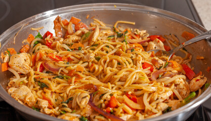 Chicken stir fry in a pan