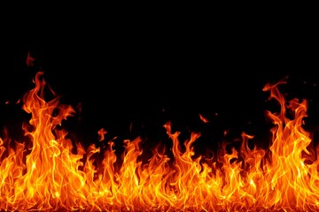 Flames on black background, closeup of orange fire with dark empty space above.