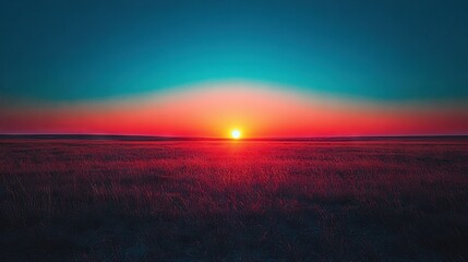 Obraz premium The sun descends on the vast expanse of high grass, framed by a sapphire sky