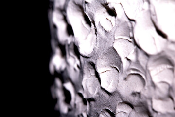 Crater Holes and Dips in Pottery Clay In a Thick White Texture Dots