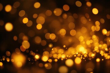 Fototapeta premium Abstract golden bokeh light effect on a dark background.