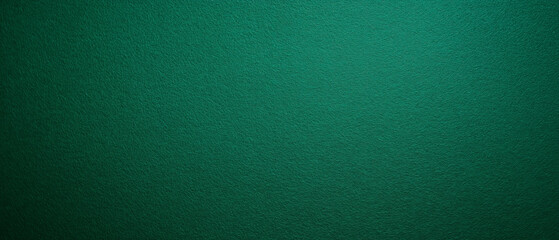 Deep green textured surface with a rich and vibrant tone creating a bold and sophisticated background
