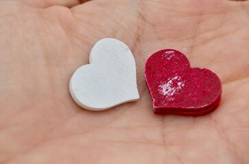 winter background frost valentine's day two hearts on the palm
