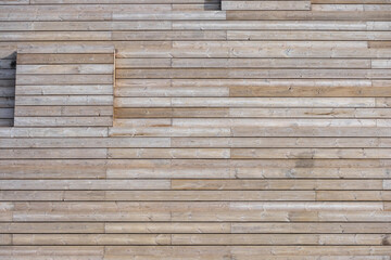 Wide, but photographed from above, a flight of wooden stairs with a light brown tint.