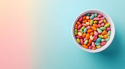 Obraz premium Colorful Beans in a White Bowl on a Pastel Background