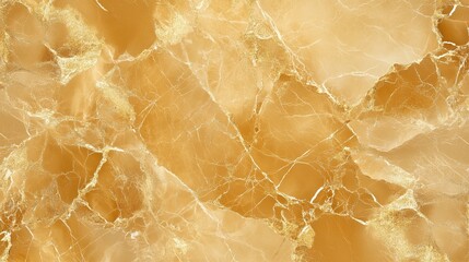 Fototapeta premium A luxurious golden marble background featuring intricate veining and rich textures, evoking a sense of opulence and elegance. The warm gold tones shimmer subtly, perfect for stylish design.