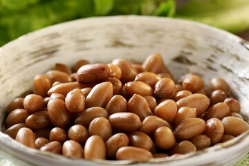 Close-up of boiled peanuts in a bowl.
