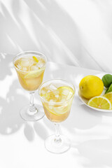 limoncello spritz in a glass on the table with lemons
