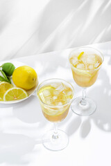 limoncello spritz in a glass on the table with lemons