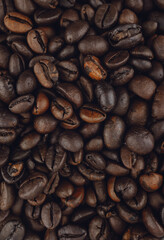 Close-up of roasted coffee beans. Rich, dark brown, and ready to brew. Aromatic and full of flavor, perfect for your morning cup.