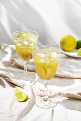 limoncello spritz in a glass on the table with lemons