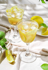 limoncello spritz in a glass on the table with lemons