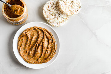peanut paste with chia on rice bread
