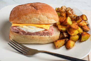fried egg and spam  breakfast sandwich