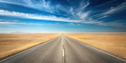 Naklejka premium Asphalt Road Cutting Through a Vast, Sun-Drenched Desert Landscape Under a Vivid Blue Sky with Wispy Clouds