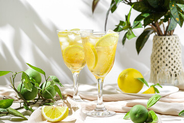 limoncello spritz in a glass on the table with lemons
