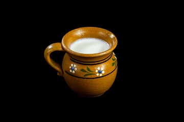 Coconut Atole in a brown traditional Mexican coup 