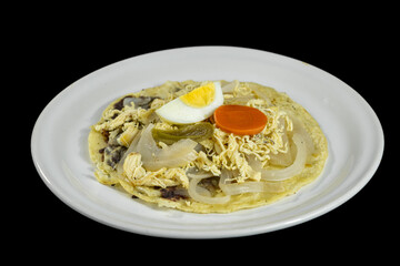 fried corn tortilla with beans, lettuce, sliced turkey, tomatoes, onion, sour orange juice, and a special dressing made with chile and achiote