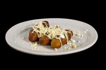 sweet fried plantains with cheese and sour cream