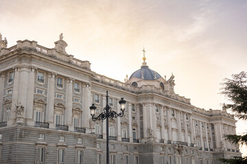 Views of the Royal Palace in Madrid, Spain at sunset. The Royal Palace of Madrid is the official residence of the King of Spain; however, the royal family does not live there, but in the Zarzuela Pal