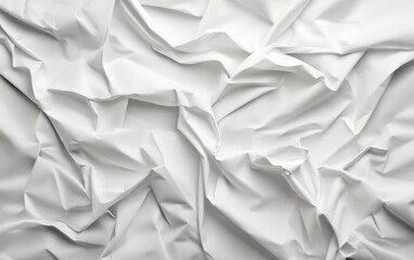 Obraz premium A texture of crumpled white paper showcasing intricate folds and shadows for creative design use.