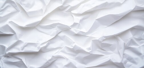 Obraz premium Close-up of crumpled white paper texture, perfect for backgrounds or design projects highlighting simplicity and elegance.