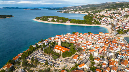Primošten(Primosten), a picturesque coastal town on the Adriatic Sea in Croatia, captivates with...