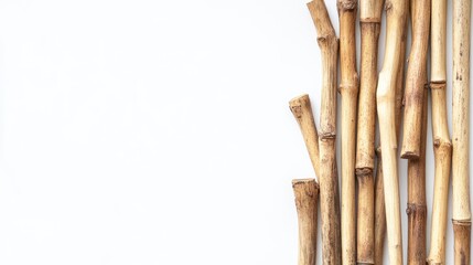 Bamboo Sticks Arrangement on White Background Ideal for Nature Inspired Craft and DIY Projects