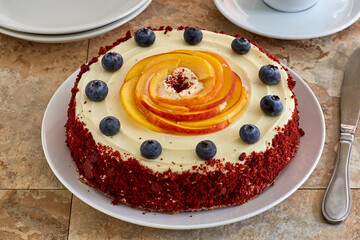 peach rose cheesecake with blueberries