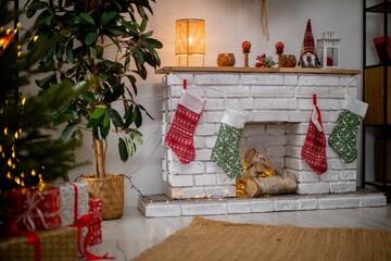 A Cozy Christmas Fireplace Enhanced with Festive Decor, Bright Stockings, and Cheerful Atmosphere