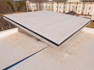 Sunny Day Time Drone Images of New TPO Roofing System on a New Commercial Building in Raleigh North Carolina: No People, Engineering, Architecture, Trades