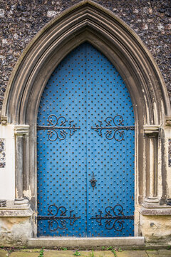 the blue painted door of a church